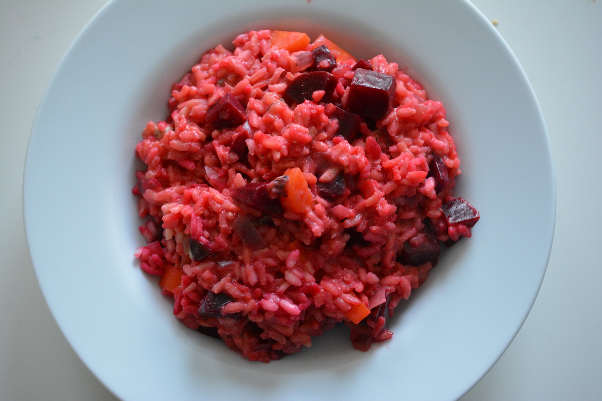 Red rissoto with added beetroot and carrot