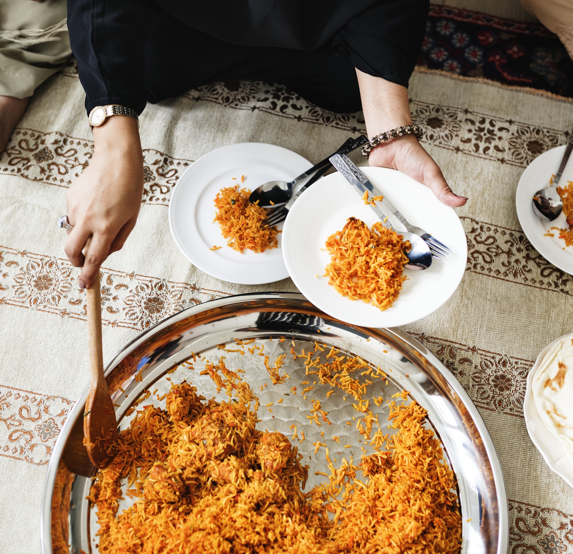 Serving chicken biryani